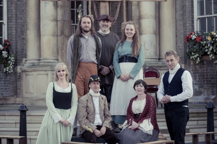 The cast of Holmes and Kable in front of Thetford Guildhall