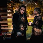 Scrooge watching Mr and Mrs Cratchit holding hands