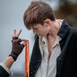 Oliver Twist being measured by Fagin