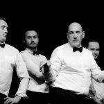 Rosie mid speech about her cheating boyfriend Patrick surrounded by the other girls, Bouncers