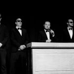 The cheesy DJ and his three sun glass wearing entourage, Bouncers