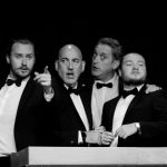 All four Bouncers saying social comment in the bar scene