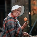 Lady selling peach coloured roses, Oliver Twist